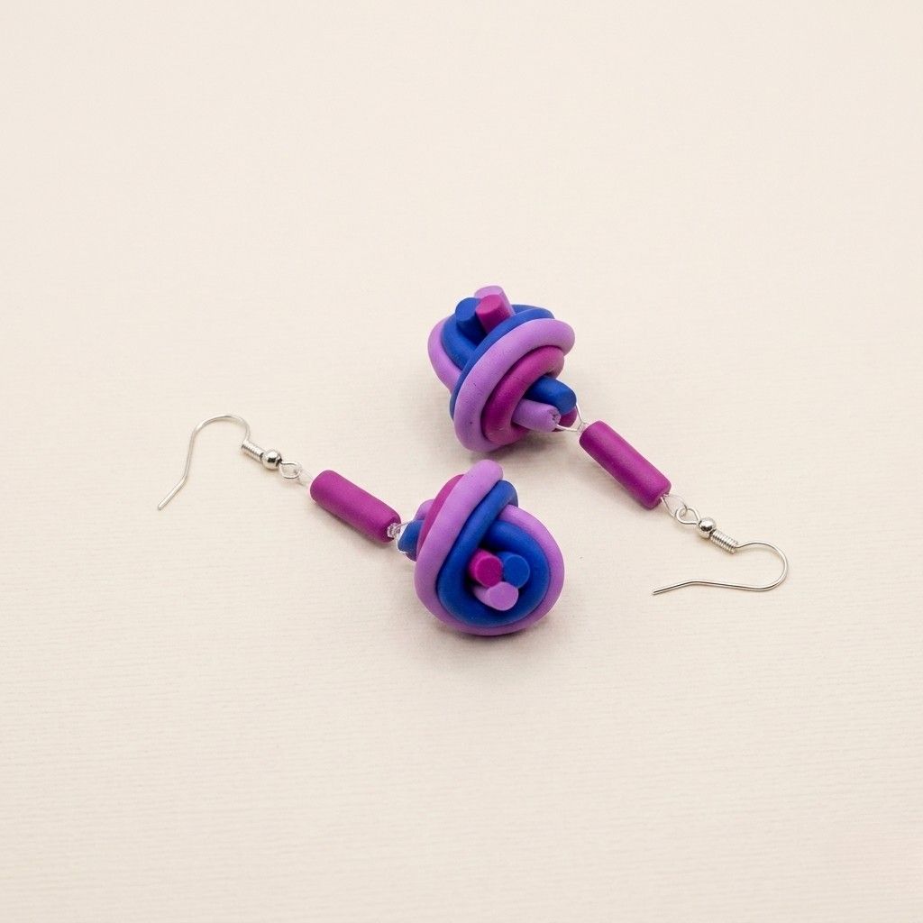 earrings-knot-pink-blue-polymer-clay-handcrafted.jpg Earrings Knot - Handcrafted 6.5cm pink and blue polymer clay knot-shaped statement earrings on silver-tone hooks.