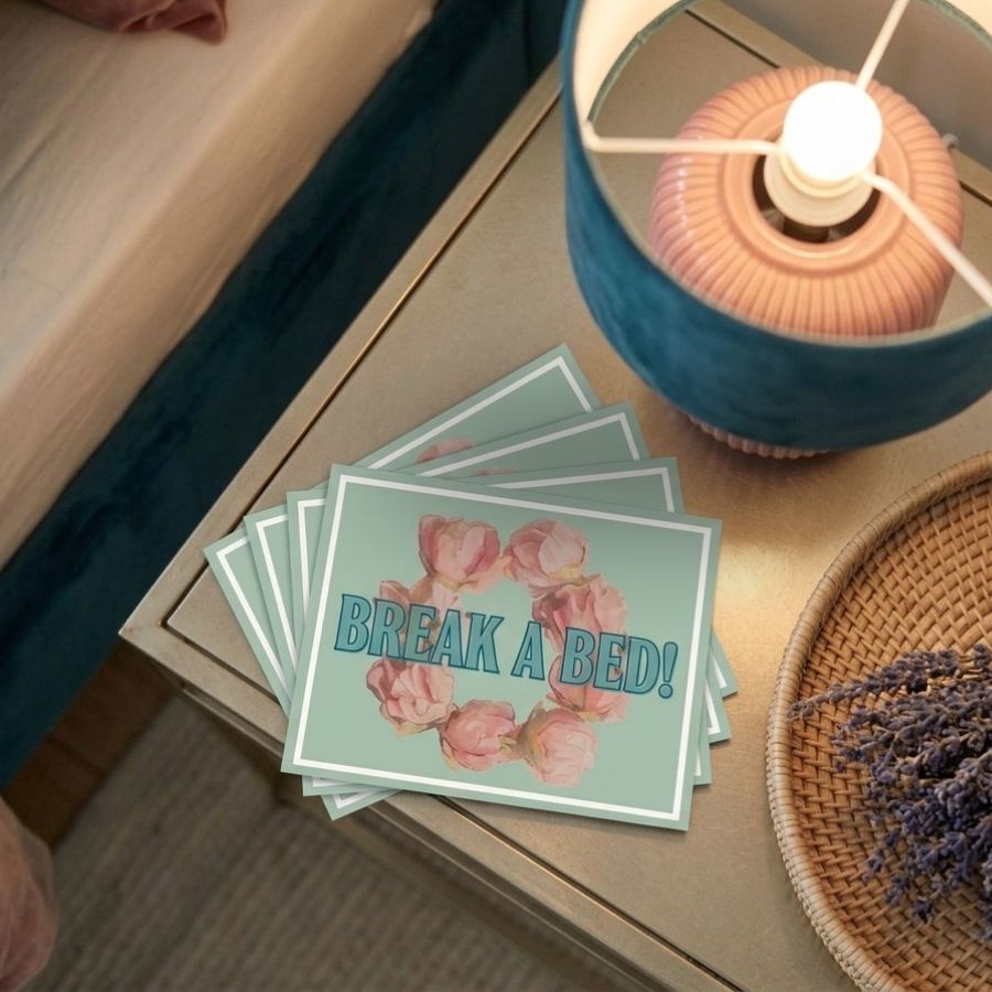 postcard-break-a-bed-histeria-concept-store.jp A whimsical postcard Break A Bed featuring a floral wreath design, created by Histeria concept store.